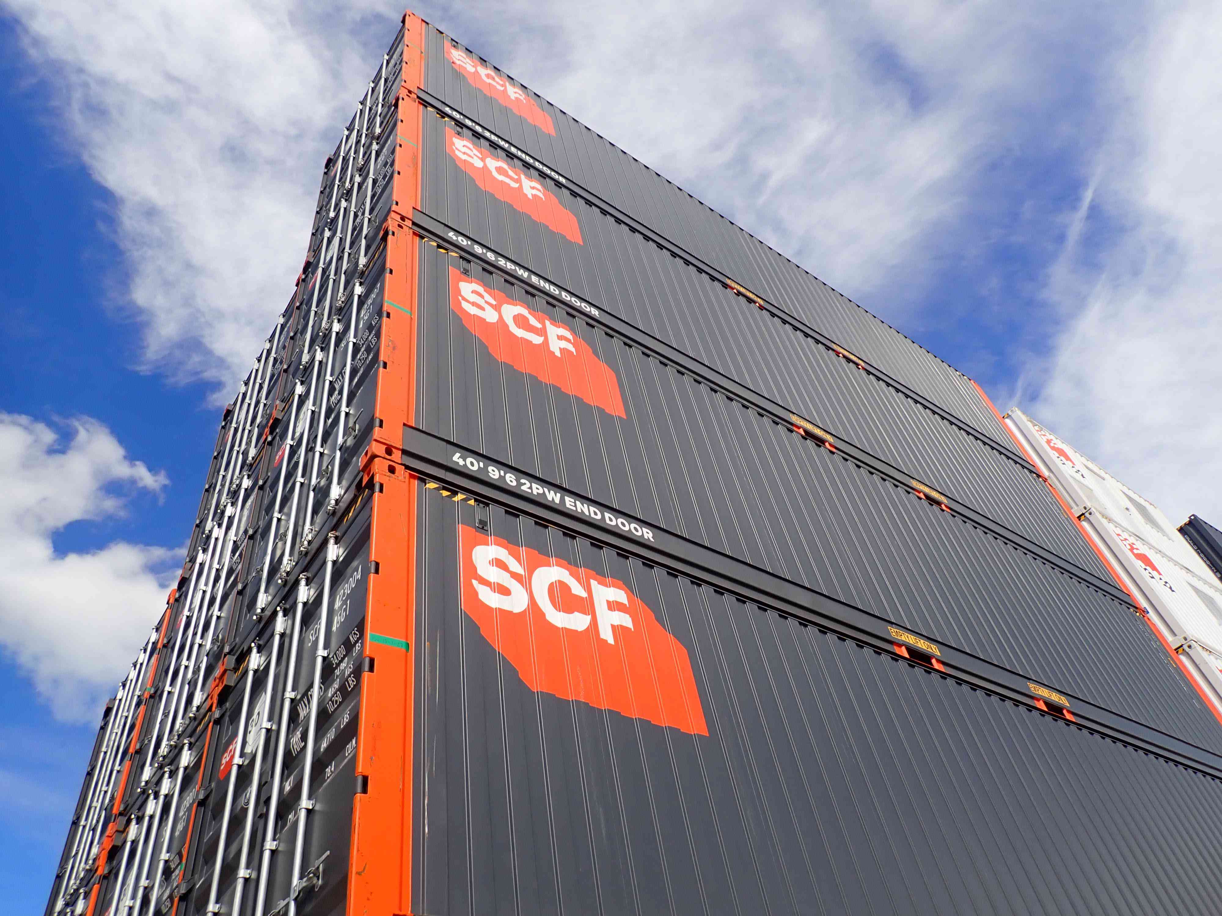 SCF Containers Stacked In Depot
