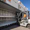 Mezzanine deck in an SCF tautliner container being adjusted by a forklift