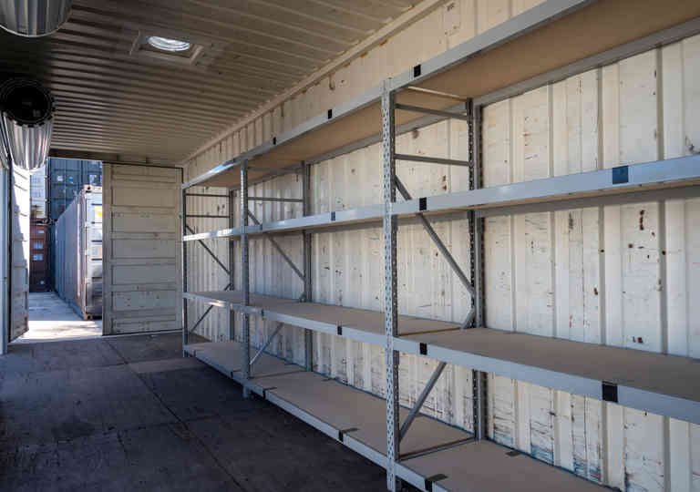 An internal view of the 40ft container with shelving and whirly bird