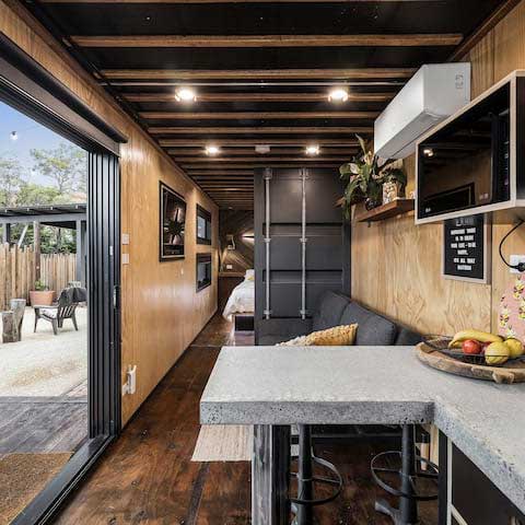 Smaller doesn't have to mean boring, with industrial finishes. Source: AirBnB, Victoria, Australia