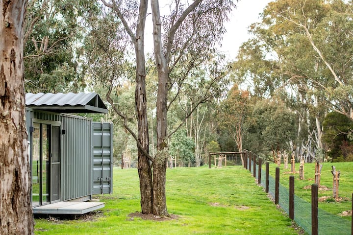 The shipping container granny flat blending in with the Mandurang Valley landscape. Source: AirBnB, Victoria, Australia.