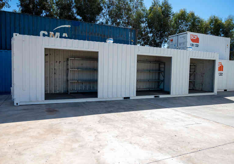 An SCF 40ft container with multiple roller doors, whirly bird and shelving